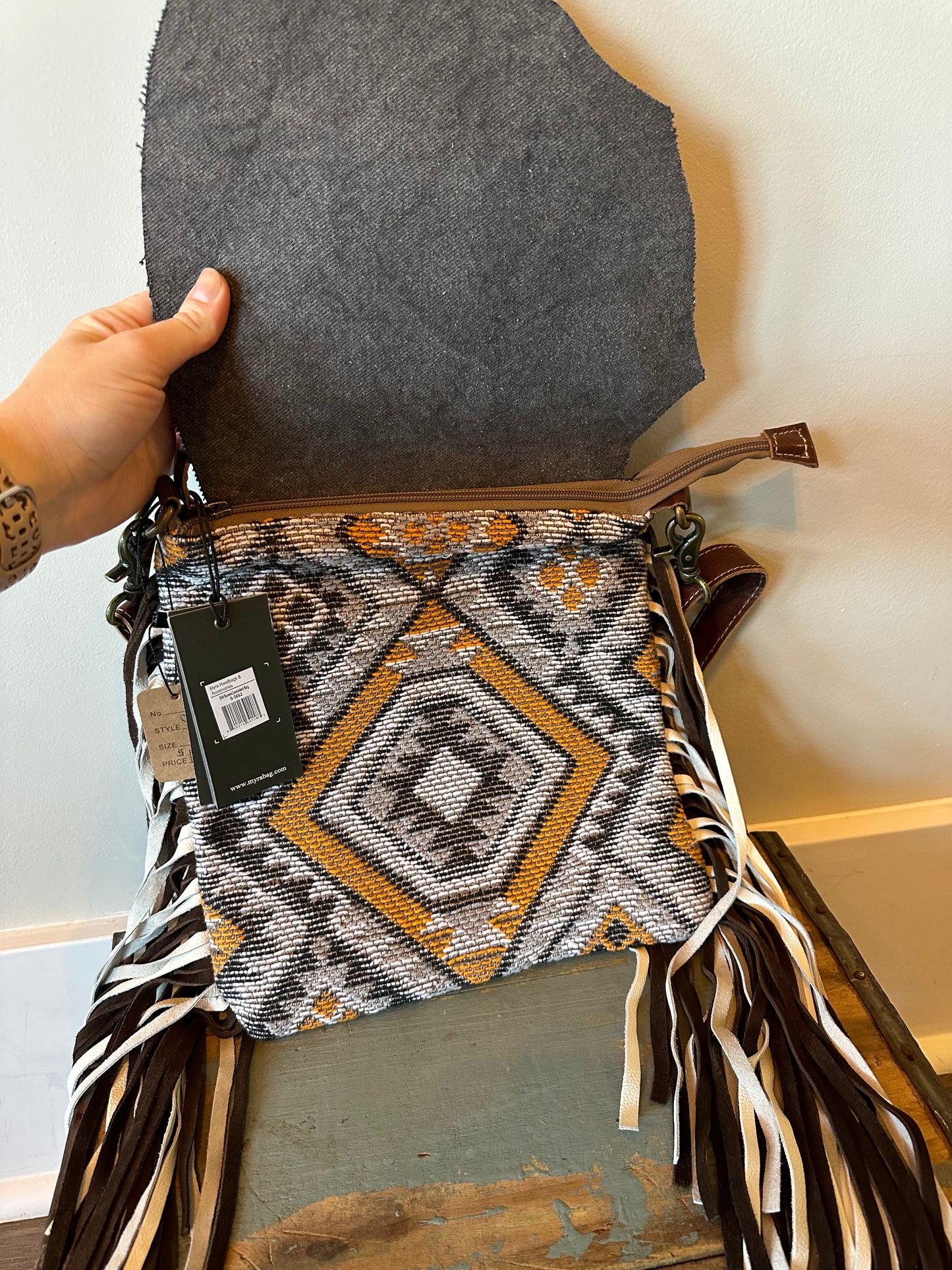 Aztec and cowhide purse